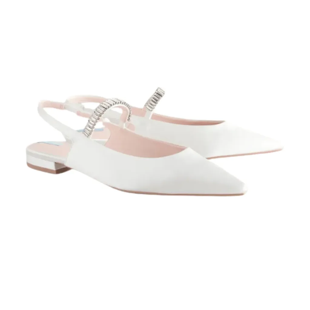 white flat wedding shoes from Lajwanti Designers with elegant silver strap