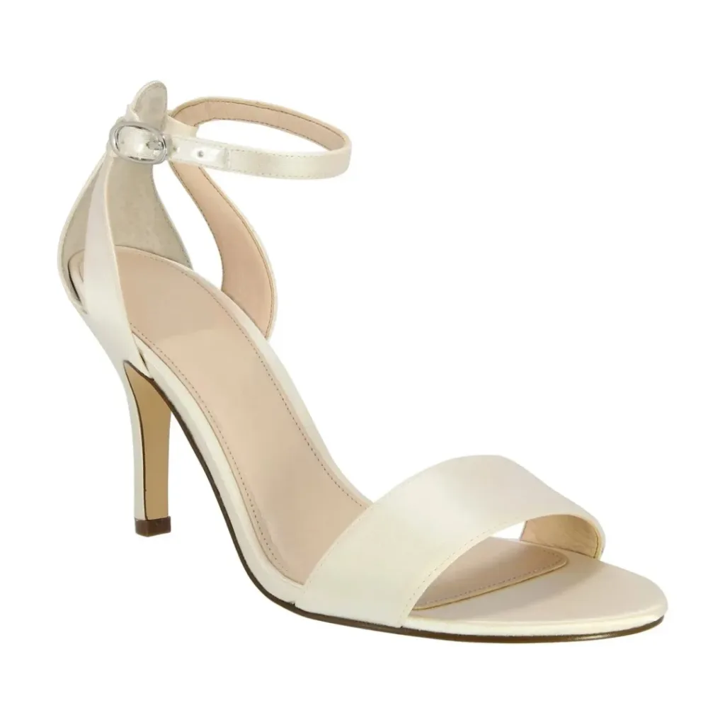 White ankle strap sandal with slim medium heel and open toe